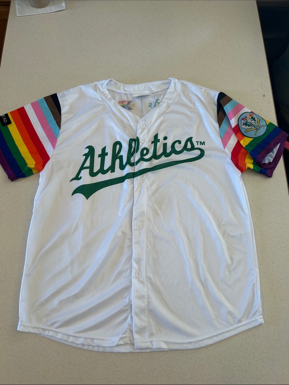 Oakland Athletics Pride Night baseball jersey XL featuring rainbow sleeves 2024